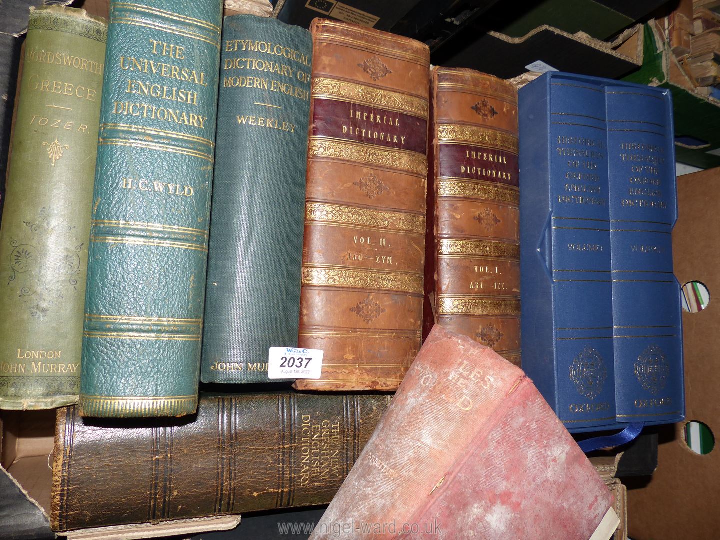 A quantity of books to include two leather bound volumes - Imperial Dictionary,