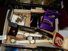 A quantity of costume jewellery and watches including necklaces, dress ring,