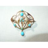 A pretty Art Nouveau style brooch, gold coloured with blue stones (some replaced),