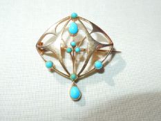 A pretty Art Nouveau style brooch, gold coloured with blue stones (some replaced),