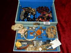 A quantity of mixed jewellery including watches, bone bangle, gold coloured bracelet, earrings,