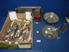 A quantity of plated cutlery including knives, forks, spoons, etc.