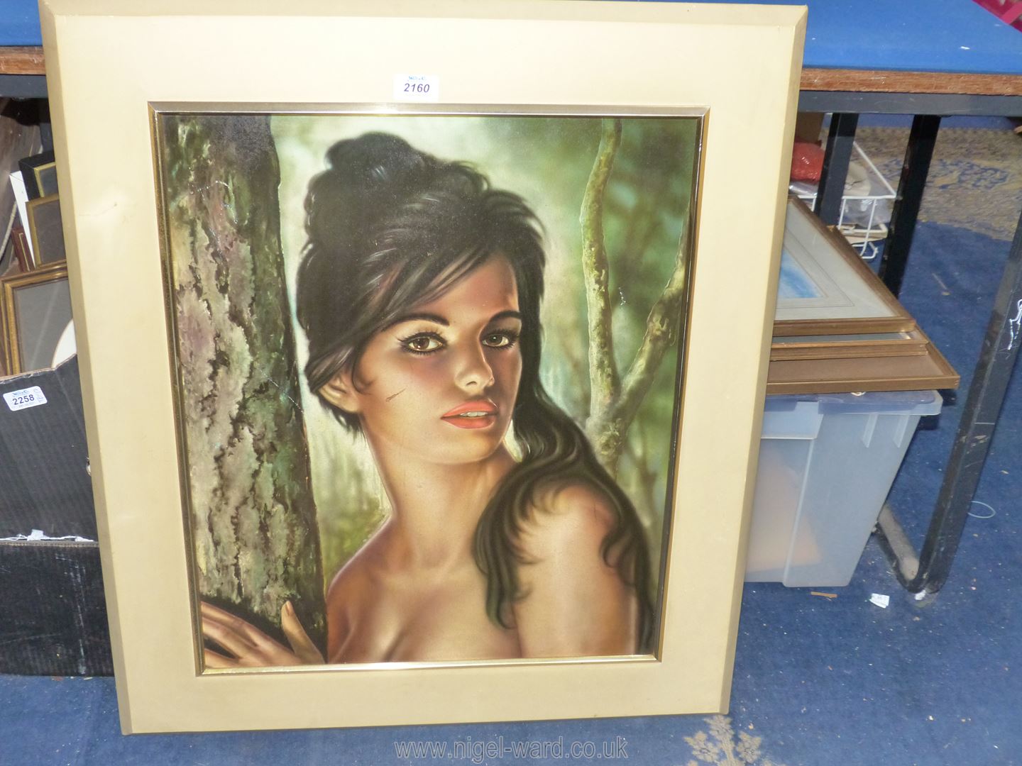 A large framed "vintage Tina picture" print depicting a dark haired woman standing amongst trees. - Image 2 of 2