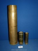 Three pieces of trench art, circa 1940's, one 13 3/4'' tall, two 4 1/2'' tall approx.