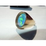 A 14ct (585) inset opal ring, marked DSD with a London imported stamp mark, date letter 'V' 1995.