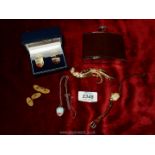 A tray of miscellaneous jewellery to include a stainless steel, leather covered hip flask,