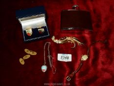 A tray of miscellaneous jewellery to include a stainless steel, leather covered hip flask,