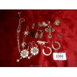 A quantity of silver ethnic style earrings, silver Tiger etc.