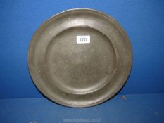 A Pewter plate, 12 3/4" diameter, 12 3/4'' diameter.