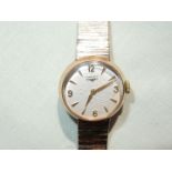 A Longines 9ct gold lady's (clockwork) wristlet watch with a bark like wristlet,