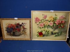 An oil on canvas floral still life indistinctly signed and a 1969 painting of roses in a vase