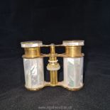 A pair of French mother of pearl and gilt brass opera glasses, c.