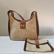 Hermes Paris: a vintage canvas toile and brown leather Handbag with original matching purse with H