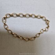 A pretty 9 carat gold chain link child's bracelet, 3 inches.