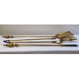 A good set of early 20th century brass fire irons (13 1/2'' longest).