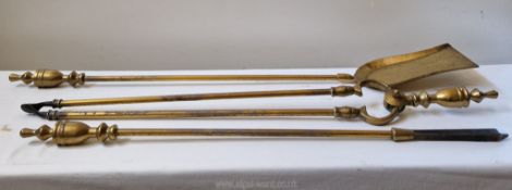 A good set of early 20th century brass fire irons (13 1/2'' longest).