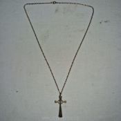 An attractive chased silver crucifix pendant on chain of 'Celtic' form, probably Iona,