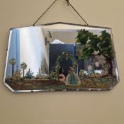 A pretty 1920s mirror painted with a garden scene 19" width.