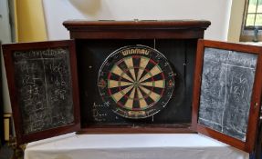 A very rare vintage ‘trompe l’oeil’ cased dart board,