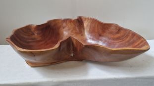 A very large dug out wooden fruit bowl 22" x 10".