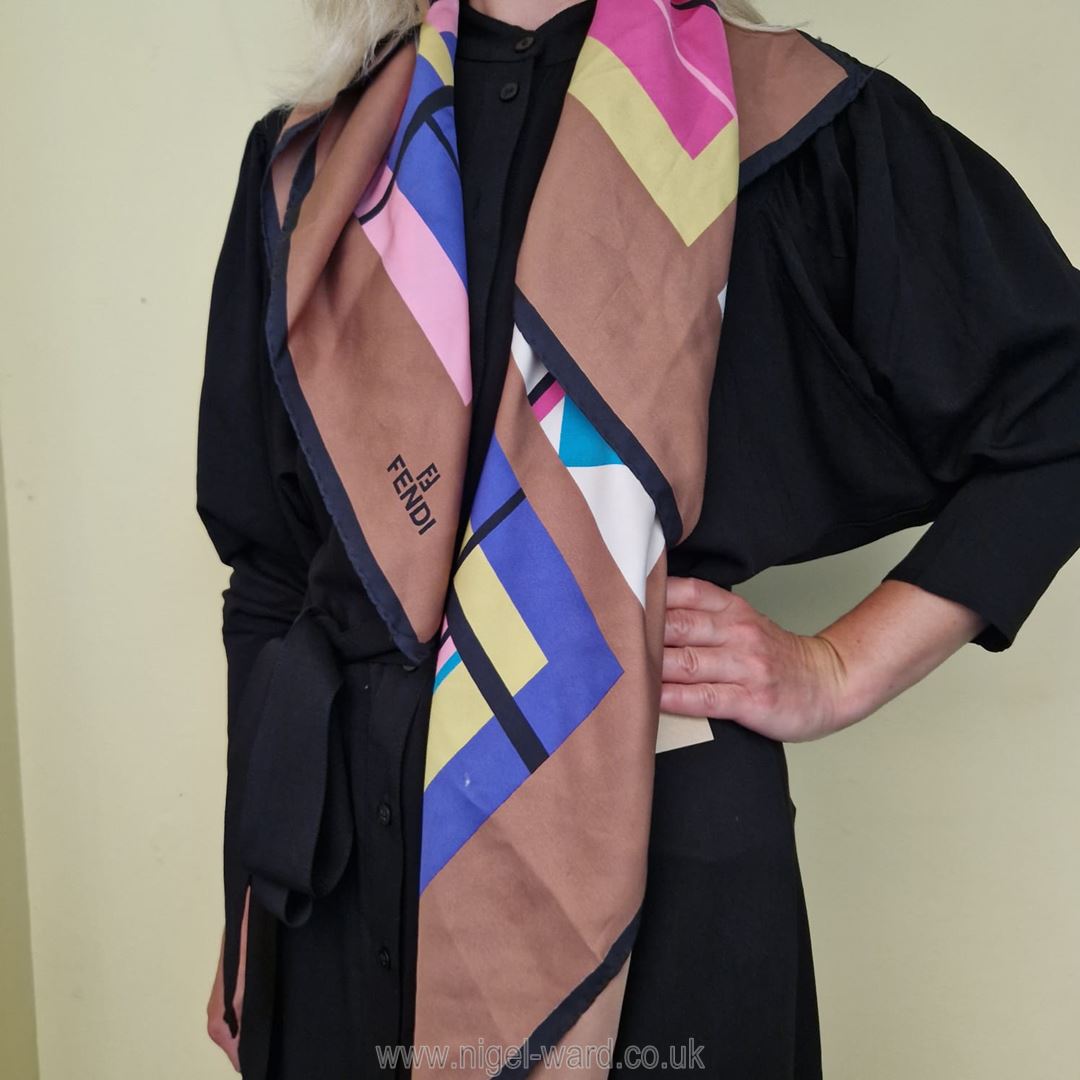 Fendi: a vintage silk Scarf with a geometric pattern in good condition, 33 ins x 34 ins.