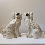 A very large pair of mid-Victorian Staffordshire mantle 'wally dogs',