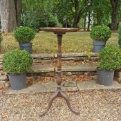 A Victorian mahogany wine table with good carved detail in the Georgian style (requiring