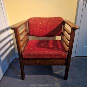 An art deco piano chair, with holder for sheet music beneath the seat.