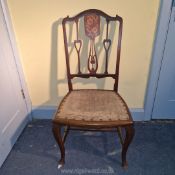 An appealing art nouveau mahogany and inlaid bedroom chair 33 in h x 17 w.