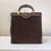 Gucci: a very rare large late 1950's Handbag in suede and leather trim with gold and silver plated