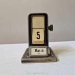 A small 1920's chrome perpetual calendar for restoration (marked patent applied for) 4 1/2'' high x