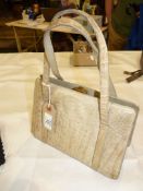 An American crocodile skin handbag.