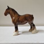 A Beswick figure of a shire horse, 8 1/2'' high.