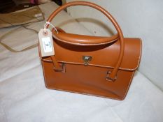 A Lambertson Truex Italy leather handbag.