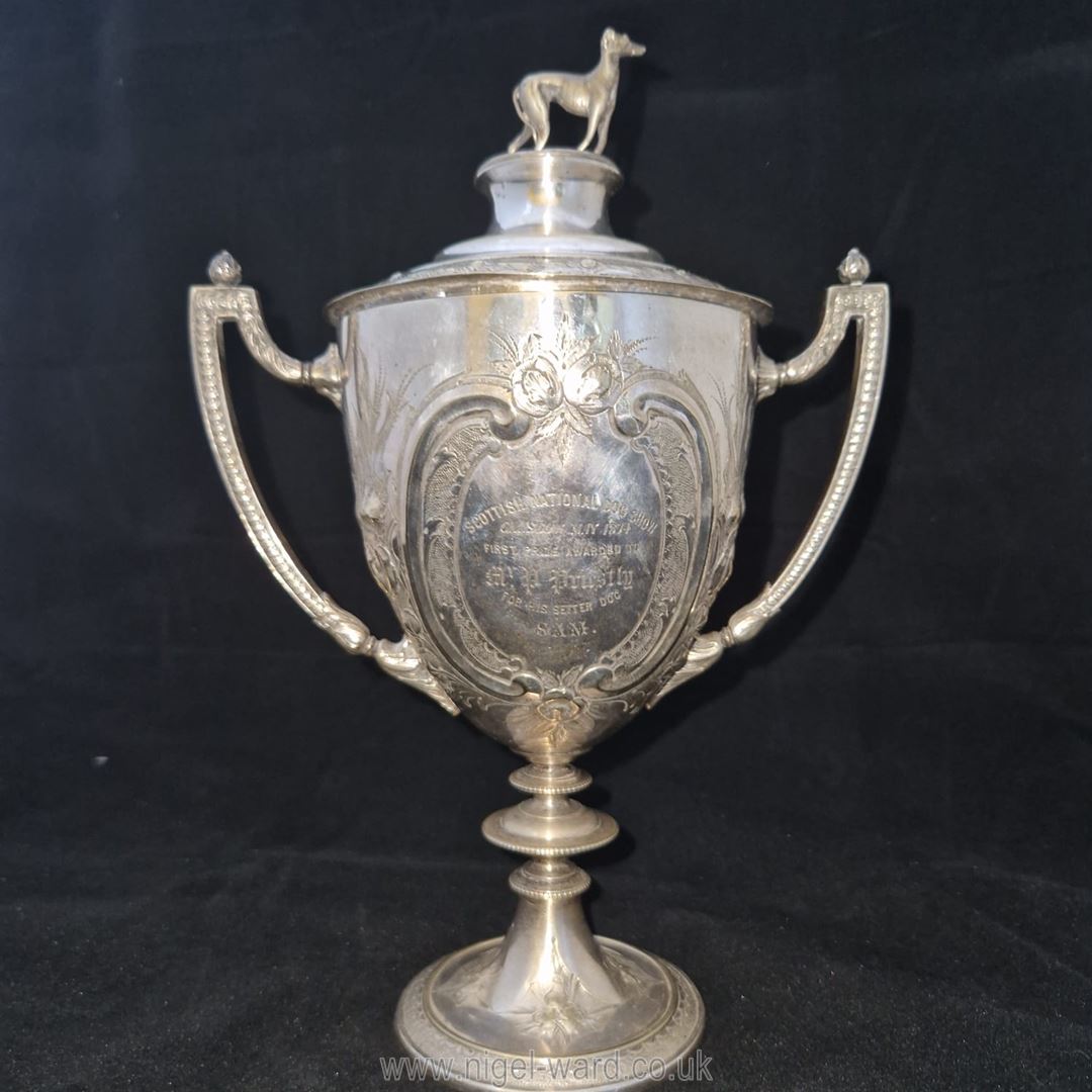 An exceptional Victorian silver-plated dog show trophy, 1874, presented to Mr P.