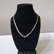 A pretty Italian woven tricolour 9 carat gold necklace, yellow, white and rose gold,