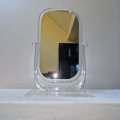 An American art deco lucite make up mirror c. 1920's-30's; 14 ins wide x 22 ins high.