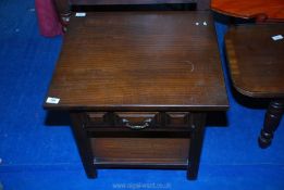 A small occasional table with lower shelf and drawer, 20" square.