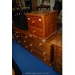 A 3 small over 4 long chest of drawers 58" wide x 18" deep x 29" high and a bedside cabinet.