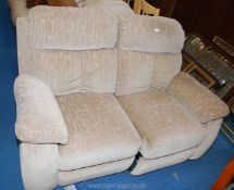 A two seater recliner sofa.