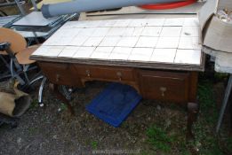 A tiled top washstand with drawers, 47" x 22" x 29".