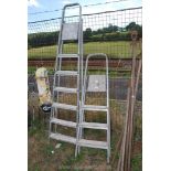 Two aluminium step ladders, (4 rung and 6 rung).