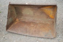 A front bucket for a Quicke loader 49" x 28" x 28" (needs attention).