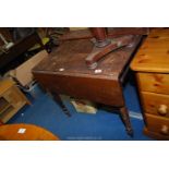 A drop leaf table, space for a drawer 34" wide x 38" x 29" high.