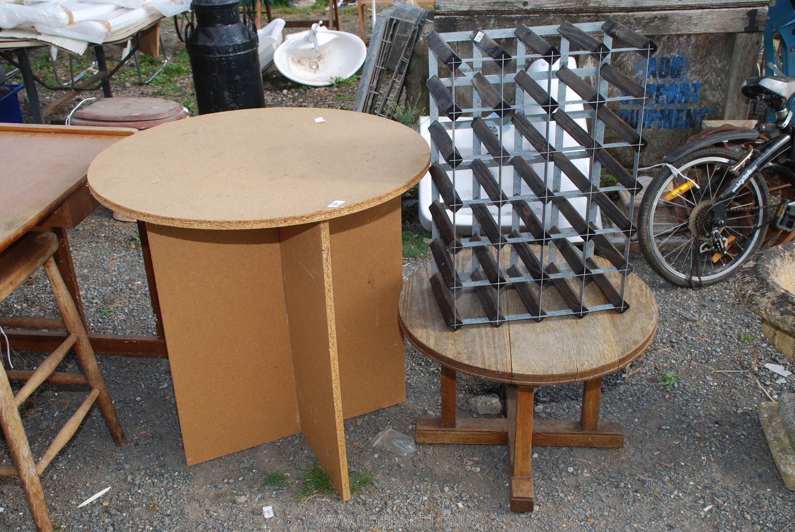 A round table 30" x 30", 24 bottle wine rack and a small round top table, 2' x 17".