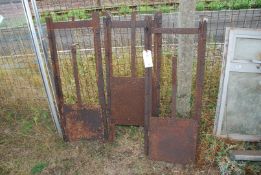 Three metal sluice gates.