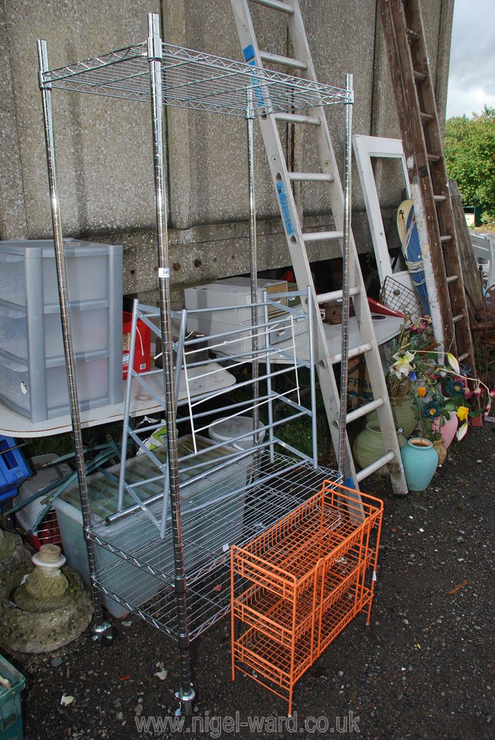 A metal clothes rail, shoe rack and vegetable rack.