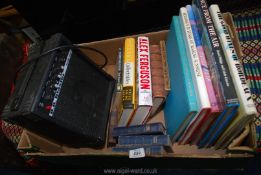 A box of books and a BB blaster amp.