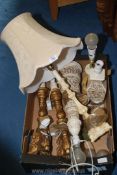 A box of miscellaneous lamps.