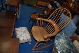 Pine based footstool, a lightwood rocking chair and a carver chair.